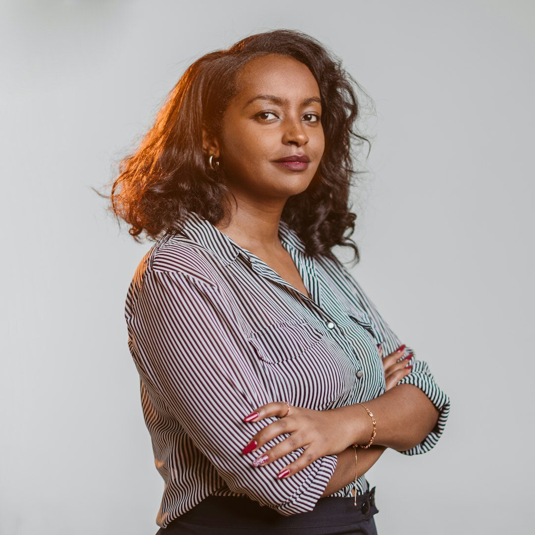 Young professional woman with natural hair smiling