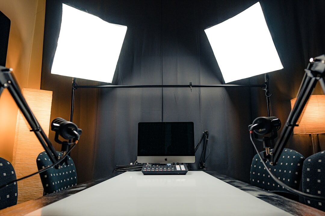 Modern broadcast TV studio with professional lighting and cameras