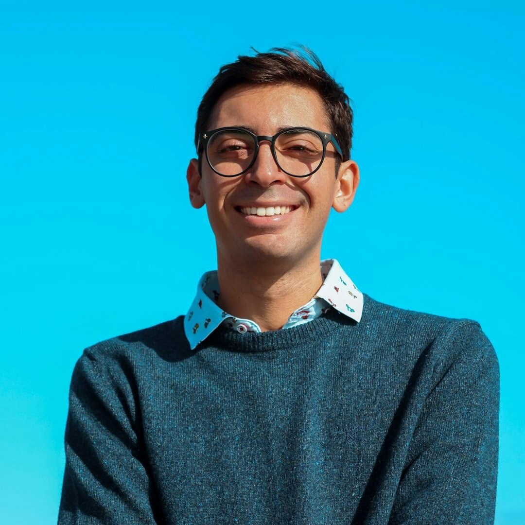 Professional man with glasses in business casual attire